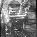 Boy in print shop