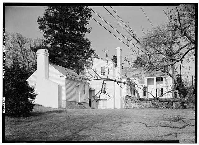 1. WEST AND SOUTH FACADES (MAIN HOUSE IN BACKGROUND) -...