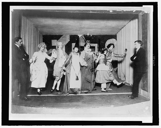 [William Zorach and others, in costume, on a small stage]...
