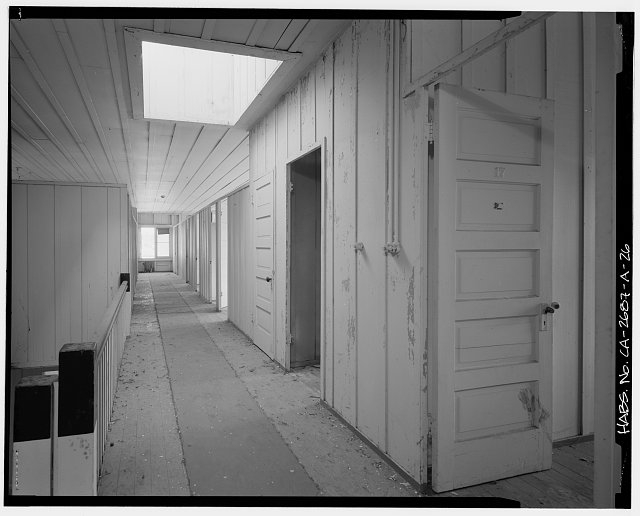 Hallway, bunkhouse, second floor interior. Looking east...