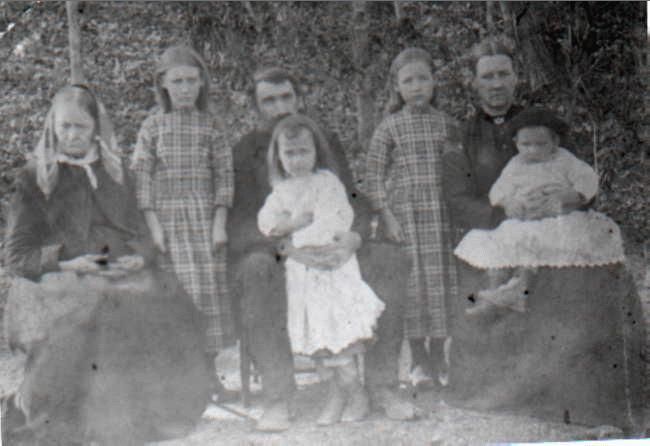 Adeline Whitaker with John W. Hooker family