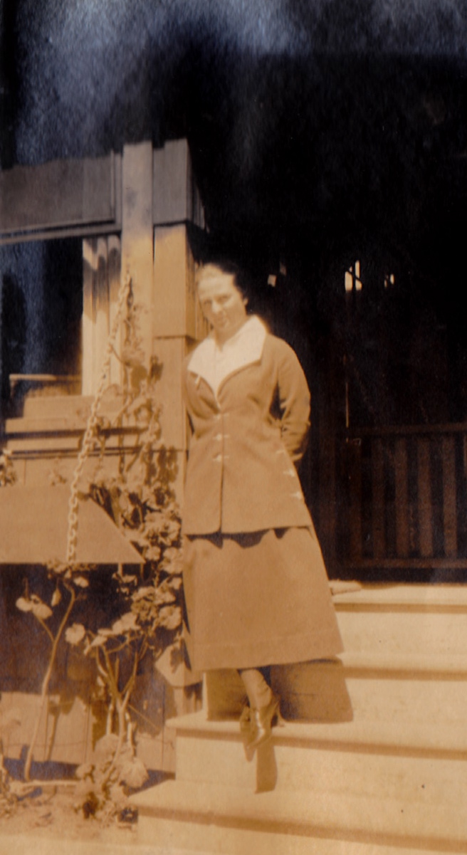 Woman leaning on the porch