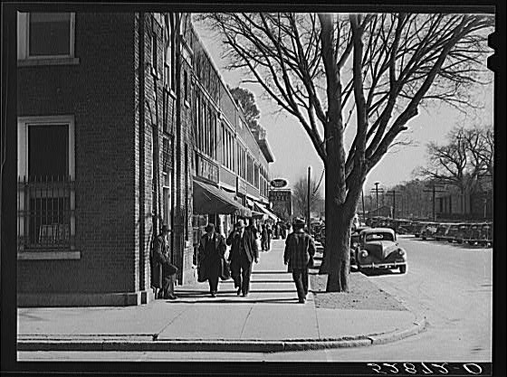 Main street on day of tobacco auctions in Mebane, North...