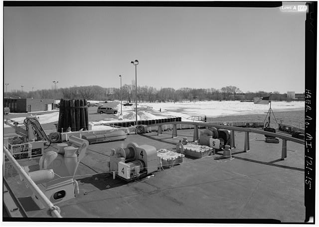 VIEW OF MAIN DECK LOOKING AFT, TOWING BITTS AND FAIRLEAD...