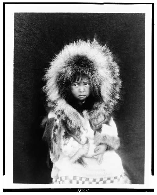 [Noatak child, three-quarter length portrait, seated,...