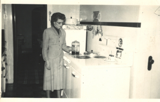 Woman in a kitchen Woman in a kitchen