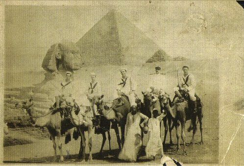 Navy Guys in Egypt in front of Pryamids on Camels