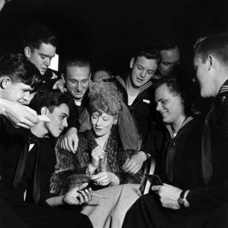 Lucille Ball was always willing to entertain the troops and to visit hospitals too.