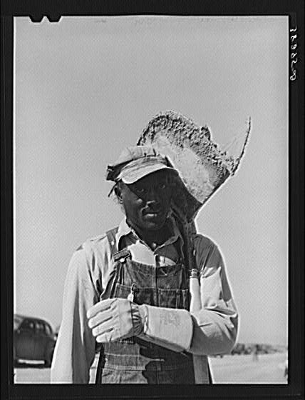 Hod carrier who is employed on U.S.H.A. project...
