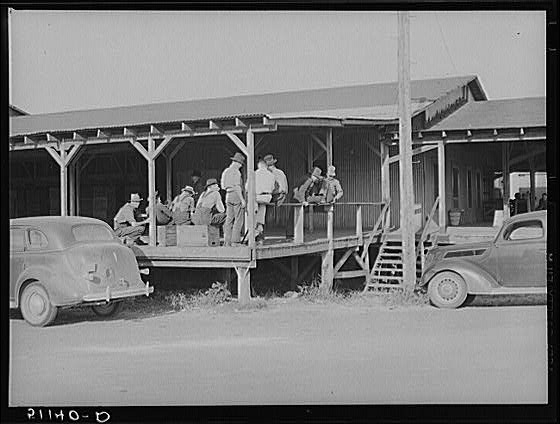 Waiting around the packing house for work. Belle Glade,...