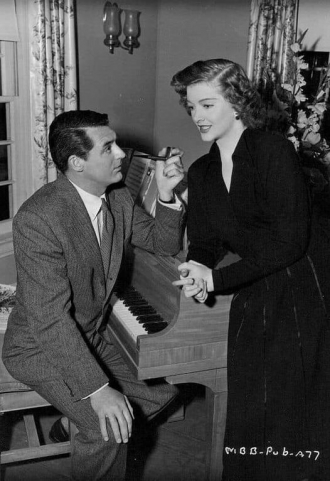 Myrna Loy and Cary Grant.