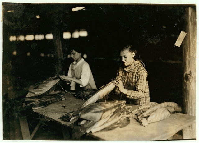 Young girls of 11, 12, 13 yrs. String in sheds of...