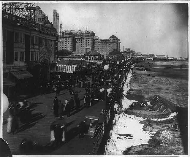 [Bird's-eye view of Easter Parade on boardwalk and man...