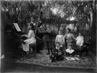 Campbell with his family playing instruments.
