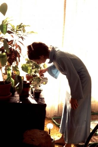 Judith D Atlee, watering plants