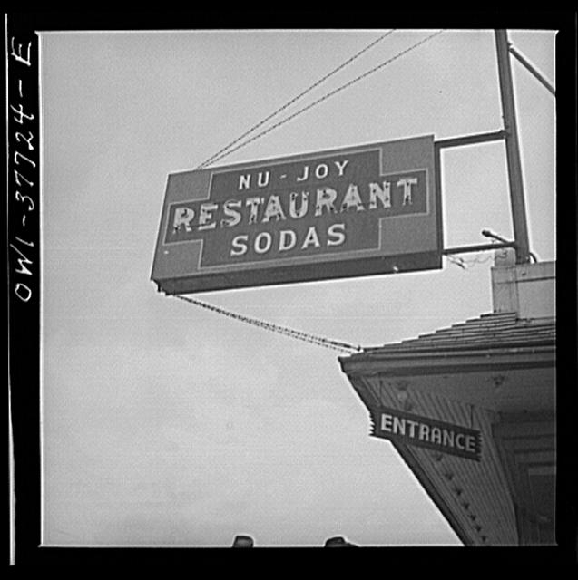 A restaurant sign on the bus route through Indiana to...