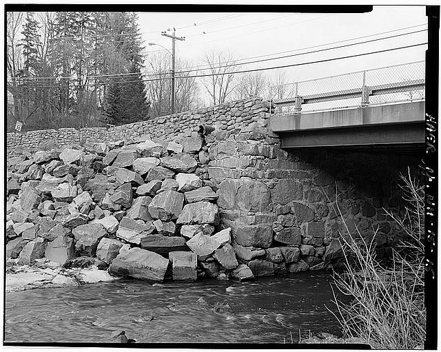 15. VIEW OF NORTH ABUTMENT AND RIP-RAP, LOOKING NORTHWEST...
