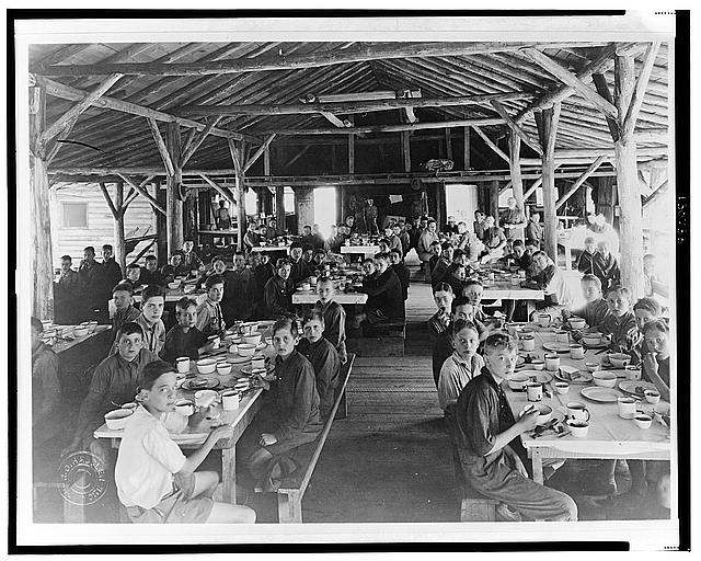 [Boy Scouts eating in mess hall at Camp Ranachqua]