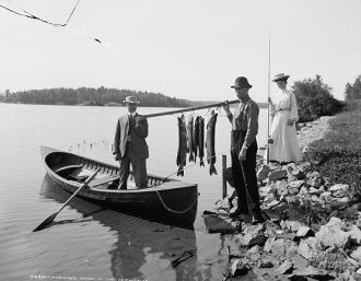 Two unknown men, fishing