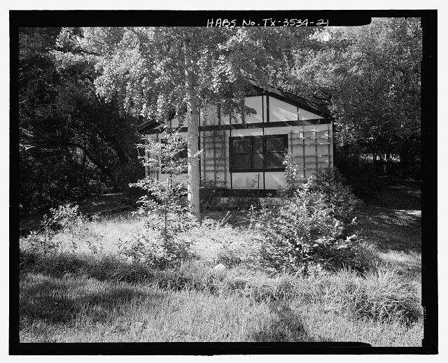 End view of two-story garage and caretaker's cottage...