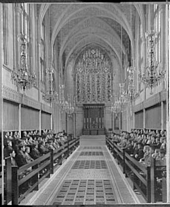 Schools. St. George's School, chapel interior with boys...