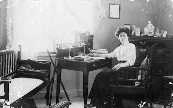 Ellen at her desk