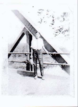 Young man on bridge