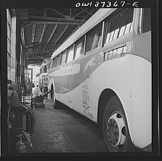 Columbus, Ohio. Working on a bus in the Greyhound garage