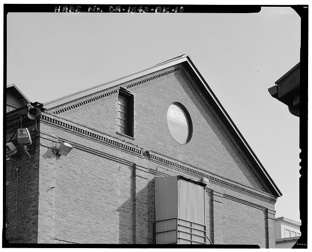Detail of circular window on north elevation; camera...