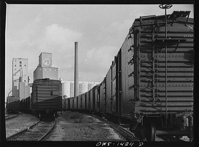 Grain elevator and mill at a railroad siding of the...