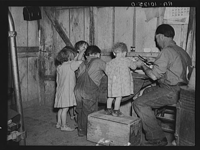 Christmas dinner in home of Earl Pauley. Near Smithfield,...