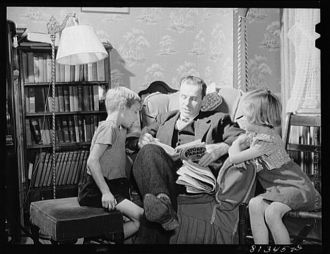 Williamstown, Massachusetts. Father reading to his children