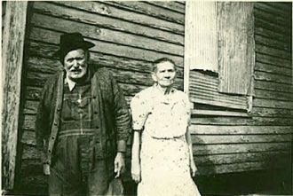 william and nancy Goode in front of there home