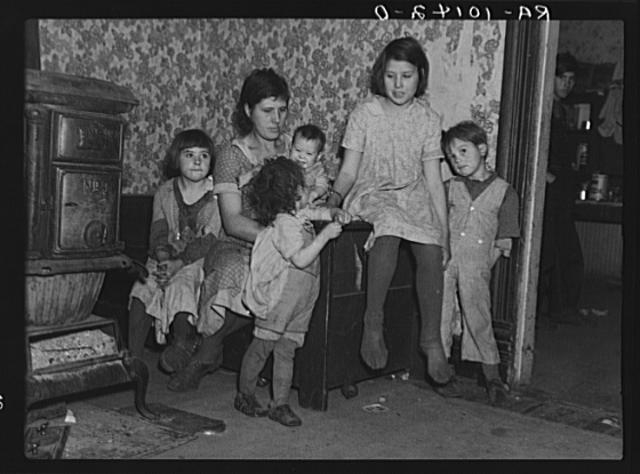 Part of Alfred Atkinson family who rent eighty acres of...