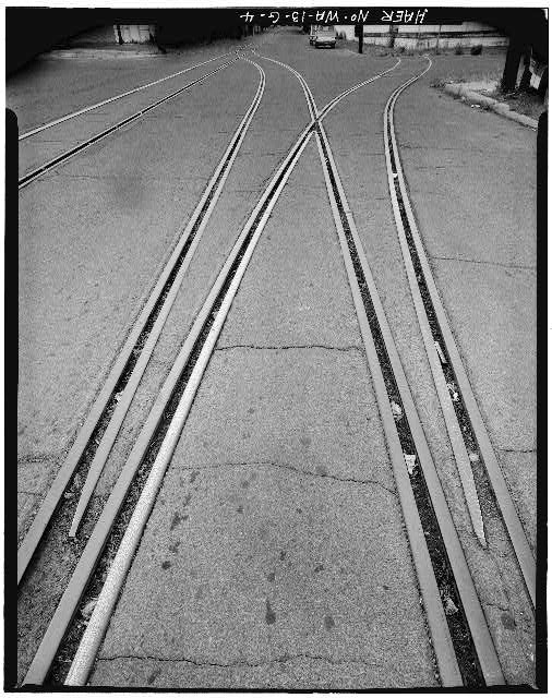4. TYPICAL STREET TRACKAGE IN ASPHALT, SHOWING INSIDE...