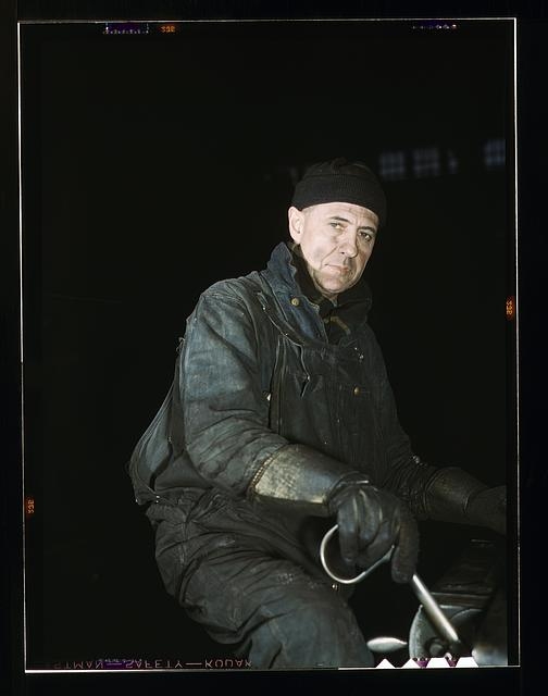 A worker in the roundhouse at the C & NW RR., Proviso...