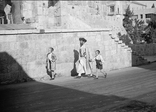 Orthodox Jew with 2 youngsters
