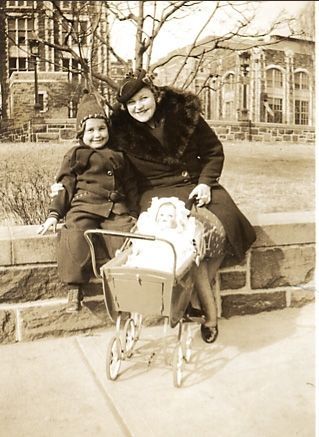 Woman & Little girl with doll in carriage