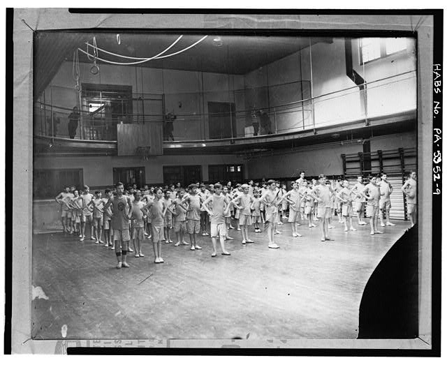 9. Physical fitness class, circa 1945 GYMNASIUM AND...