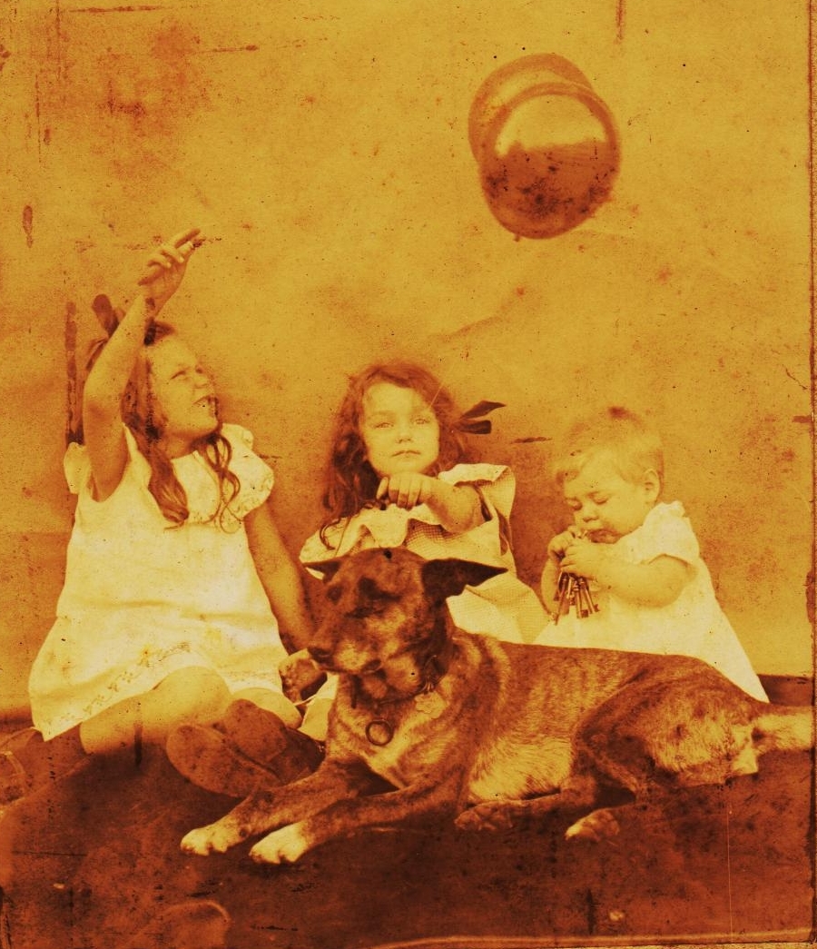 Unknown Girls with Dog and Balloons