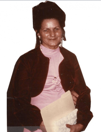 Maxine E Elvig