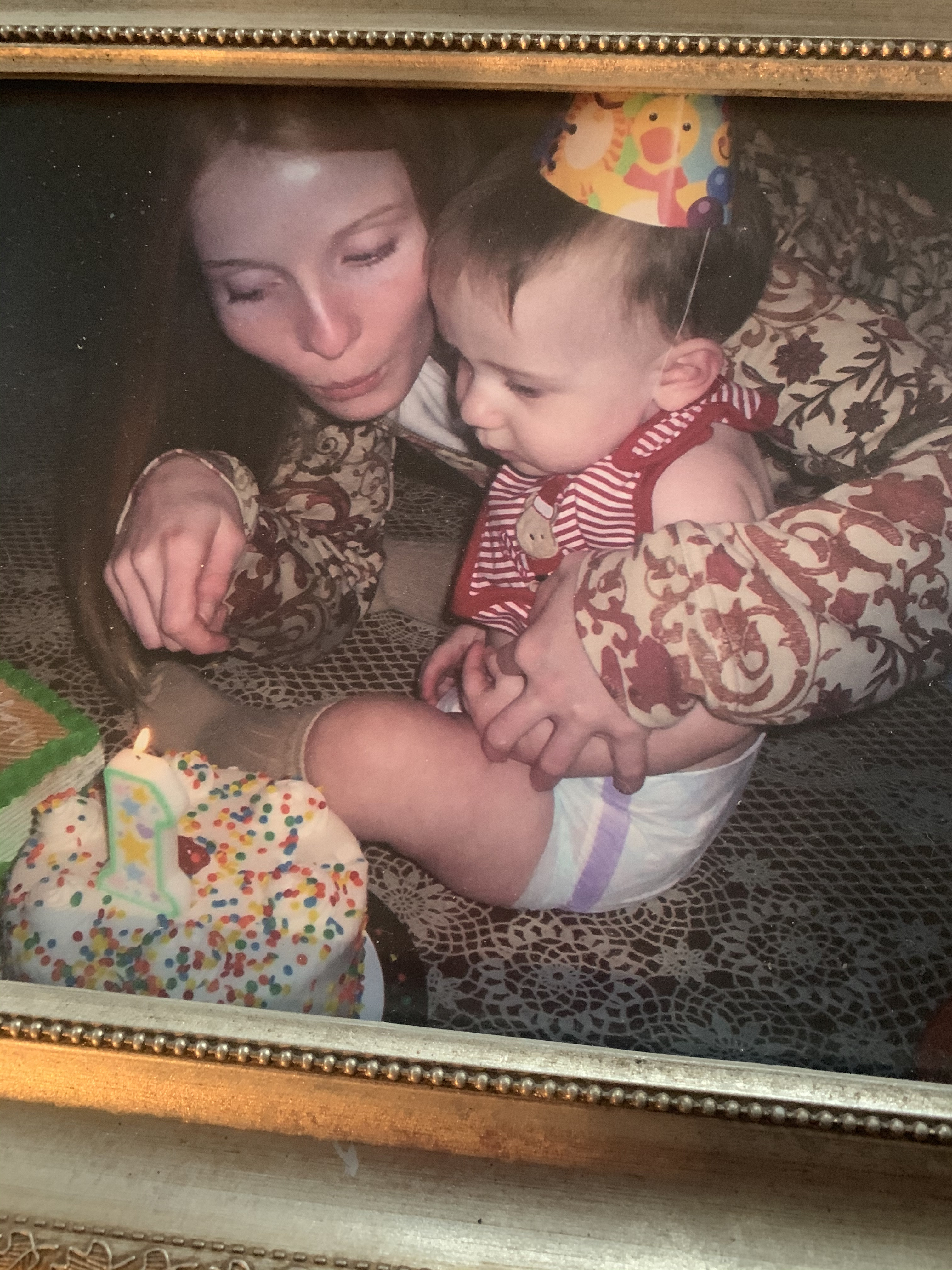 Allison with her son on his first birthday 