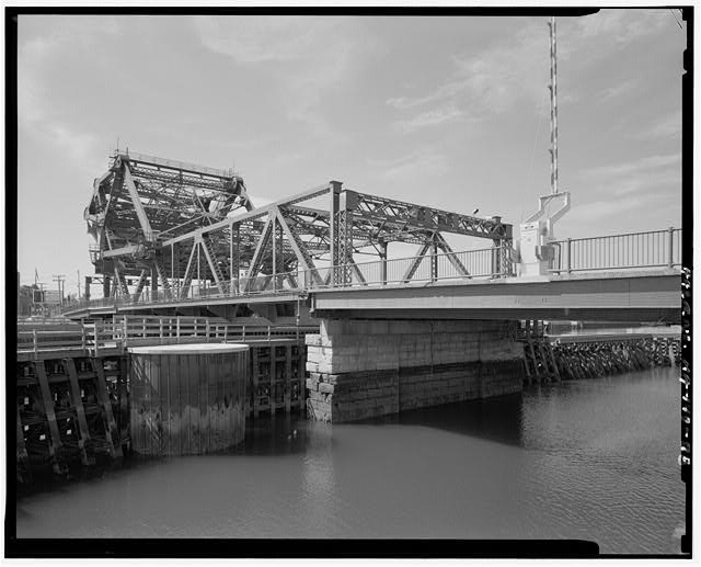 28. Oblique view showing north span, piers and bascule...