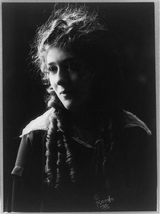 [Mary Pickford, half-length portrait, facing left]