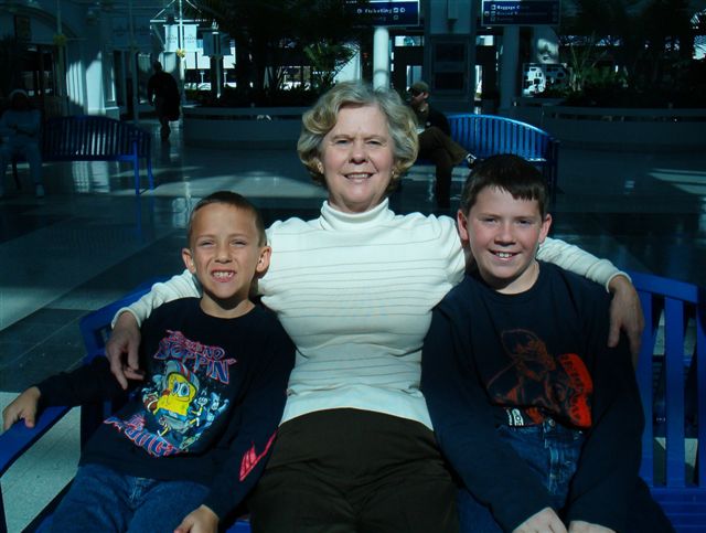 Grandmother, Frankie Davis Inman sits and waits with her grandsons for their dad's arrival from Iraq
