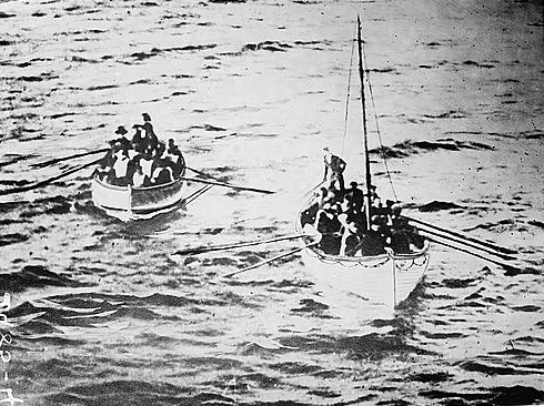TITANIC lifeboats nearing the CARPATHIA