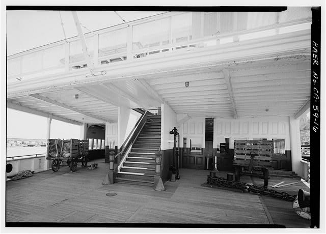 16. Forward car deck, central stairs leading to passenger...
