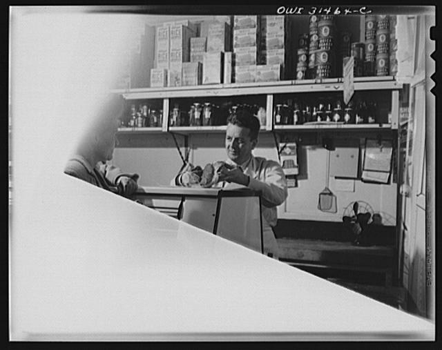 Butcher in a grocery store, in a scene during the filming...