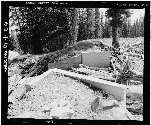 6. VIEW OF DEBRIS-CHOKED CONCRETE SPILLWAY (FREEBOARD...