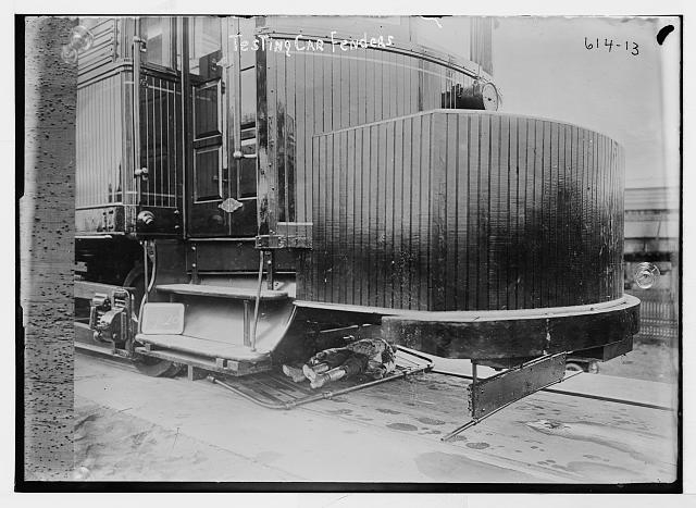 Testing car fender on end of railroad car